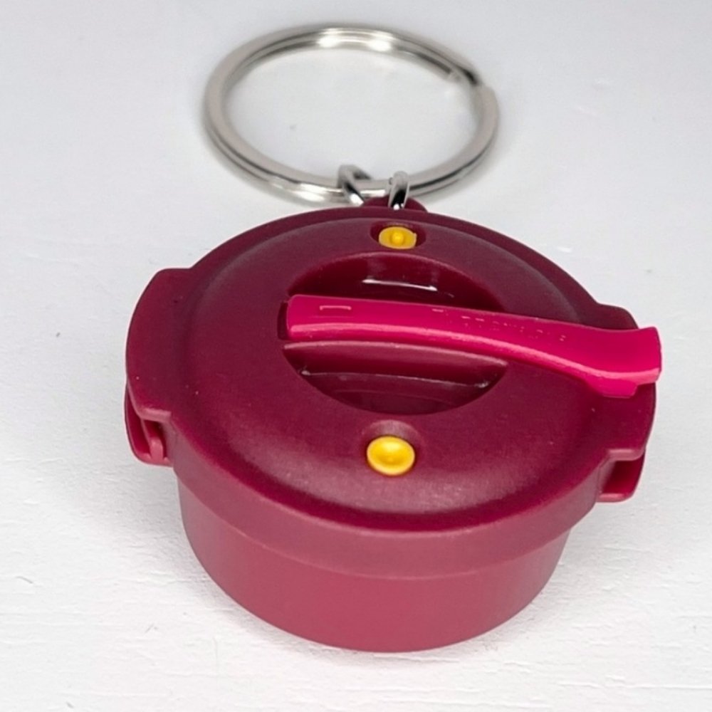 NEW! Tupperware keychain NOT FOR SALE! DO NOT PURCHASE! - Picture 1 of 2